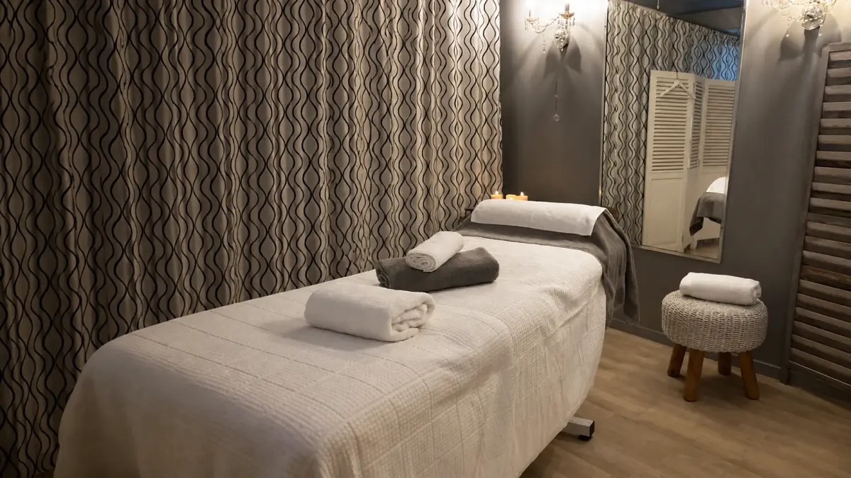 Warm, private Beauty Rooms at Noosa waxing room with linen, timber and coastal light